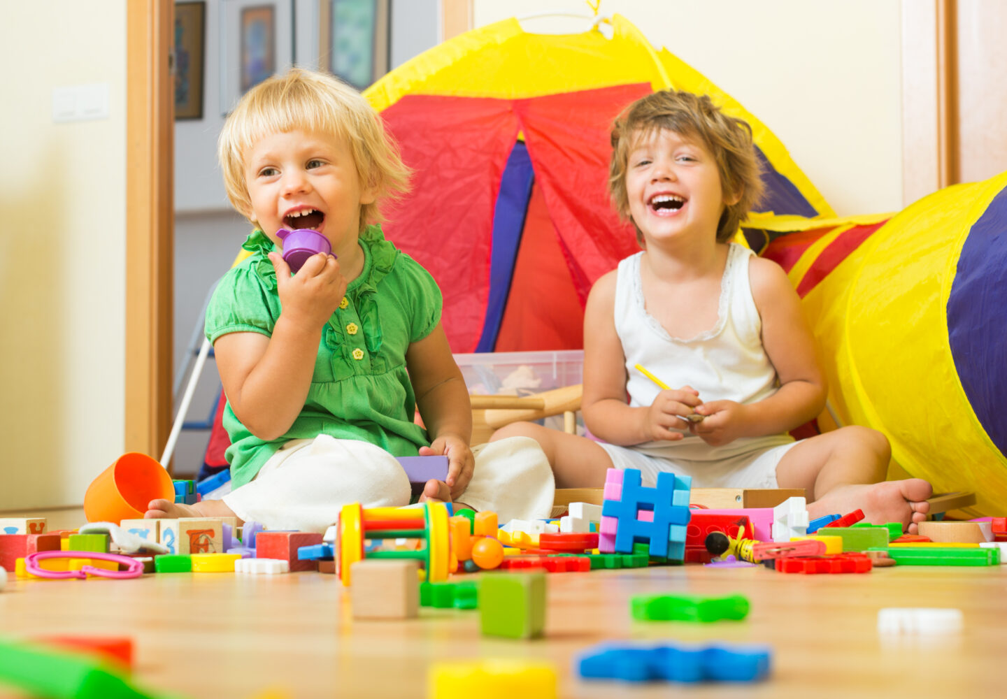 FunJoyLand children-playing-with-blocks-1440x1000 5 Must-have Toys for Kids for your Child's Playroom | Funjoyland 