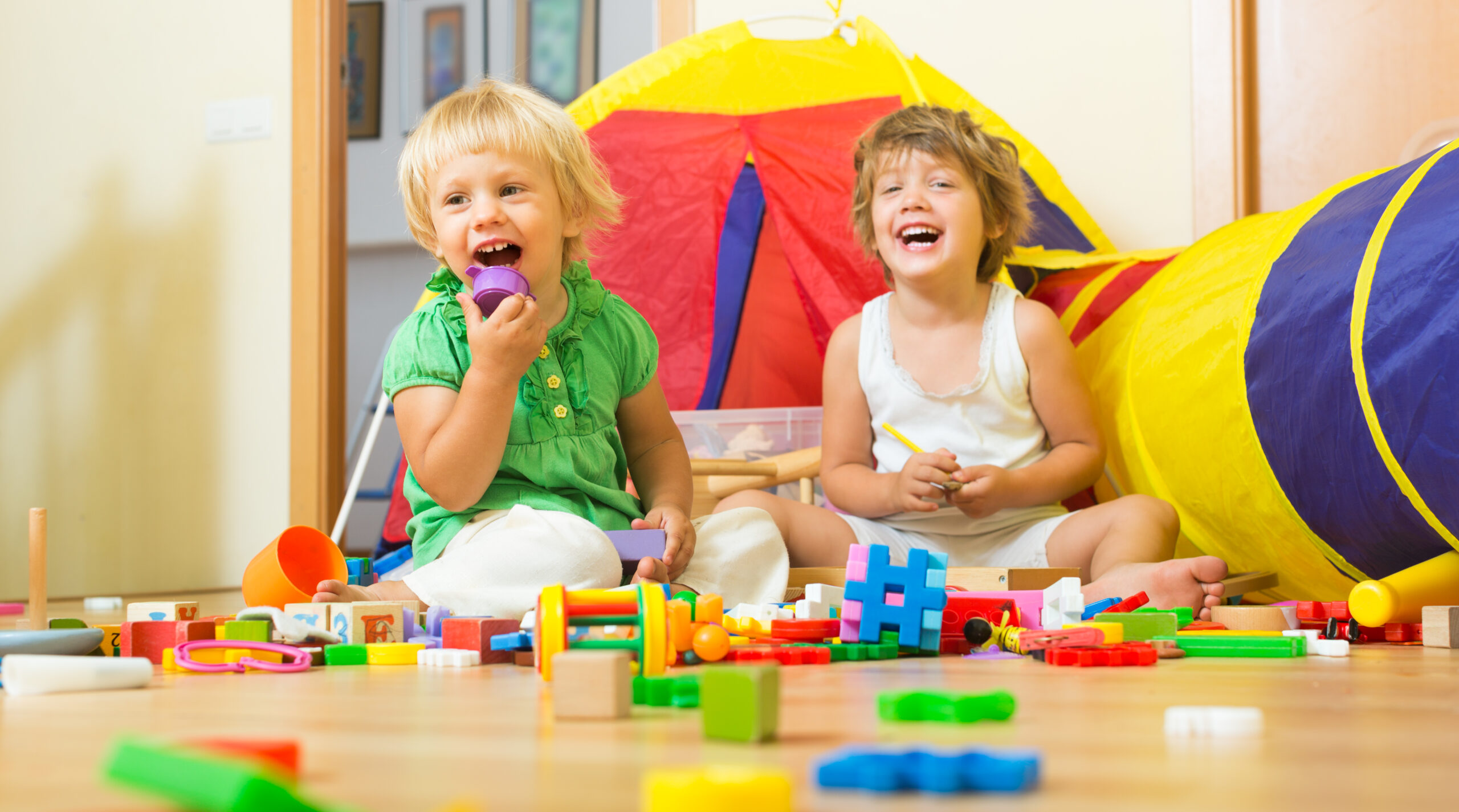 FunJoyLand children-playing-with-blocks-scaled 5 Must-have Toys for Kids for your Child's Playroom | Funjoyland 