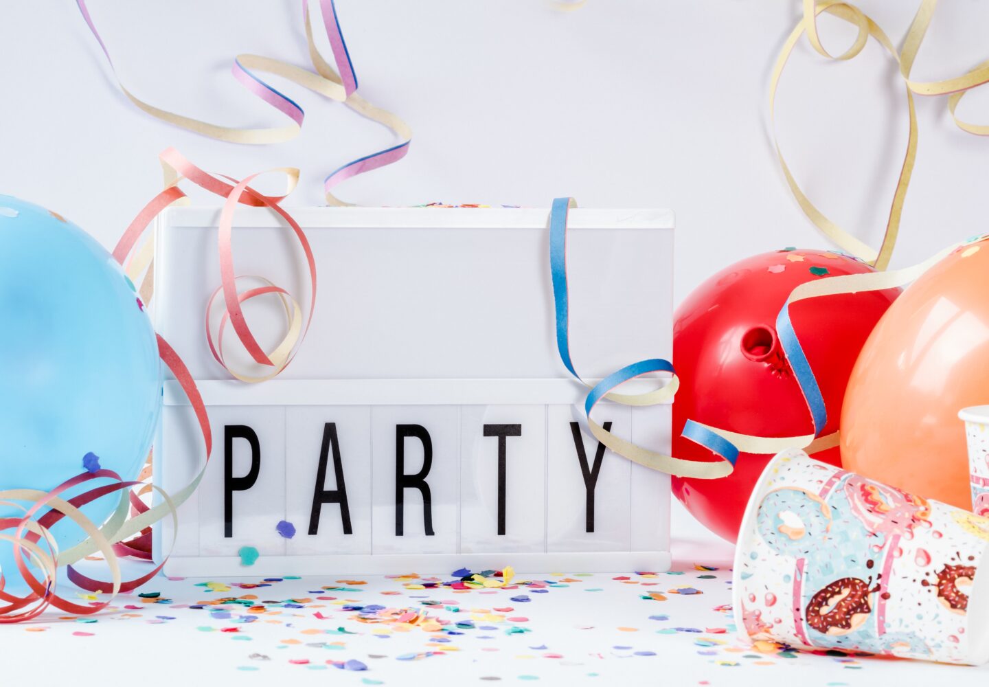 FunJoyLand colorful-balloons-with-paper-confettis-led-lamp-board-with-party-written-it-1440x1000 3 types of party supplies you can choose from | Funjoyland 